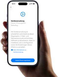 Eine rechte Hand hält ein iPhone, dessen Display einen Text mit einer Beschreibung der Geräteverwaltung und der Option zum Anmelden zeigt